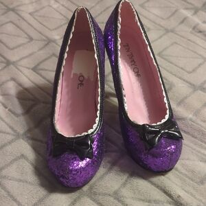 Ten Thirty One" purple princess glitter heels with a black bows